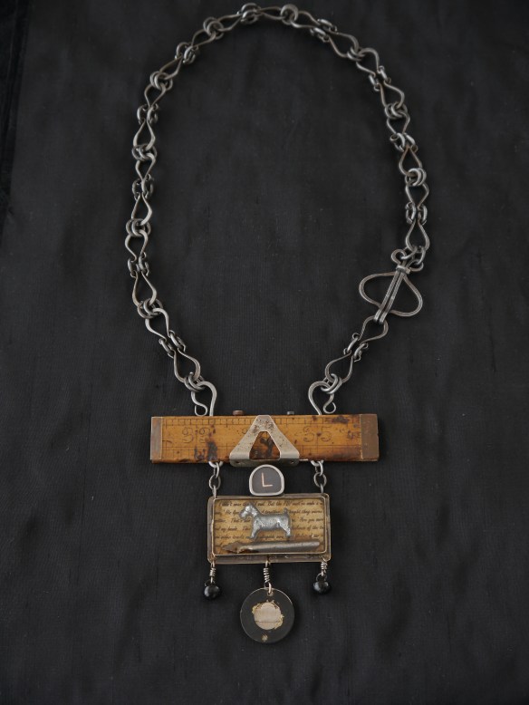 Pendant, showing steel wire chain